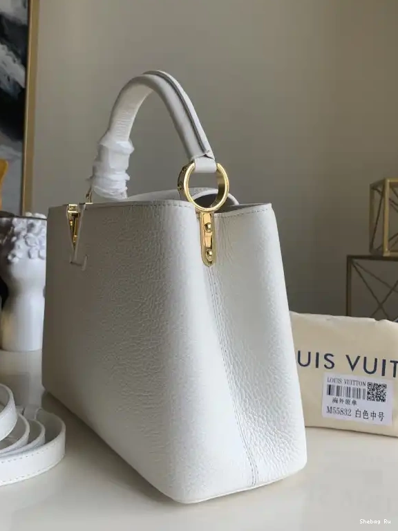 CAPUCINES LOUIS PM VUITTON 0619